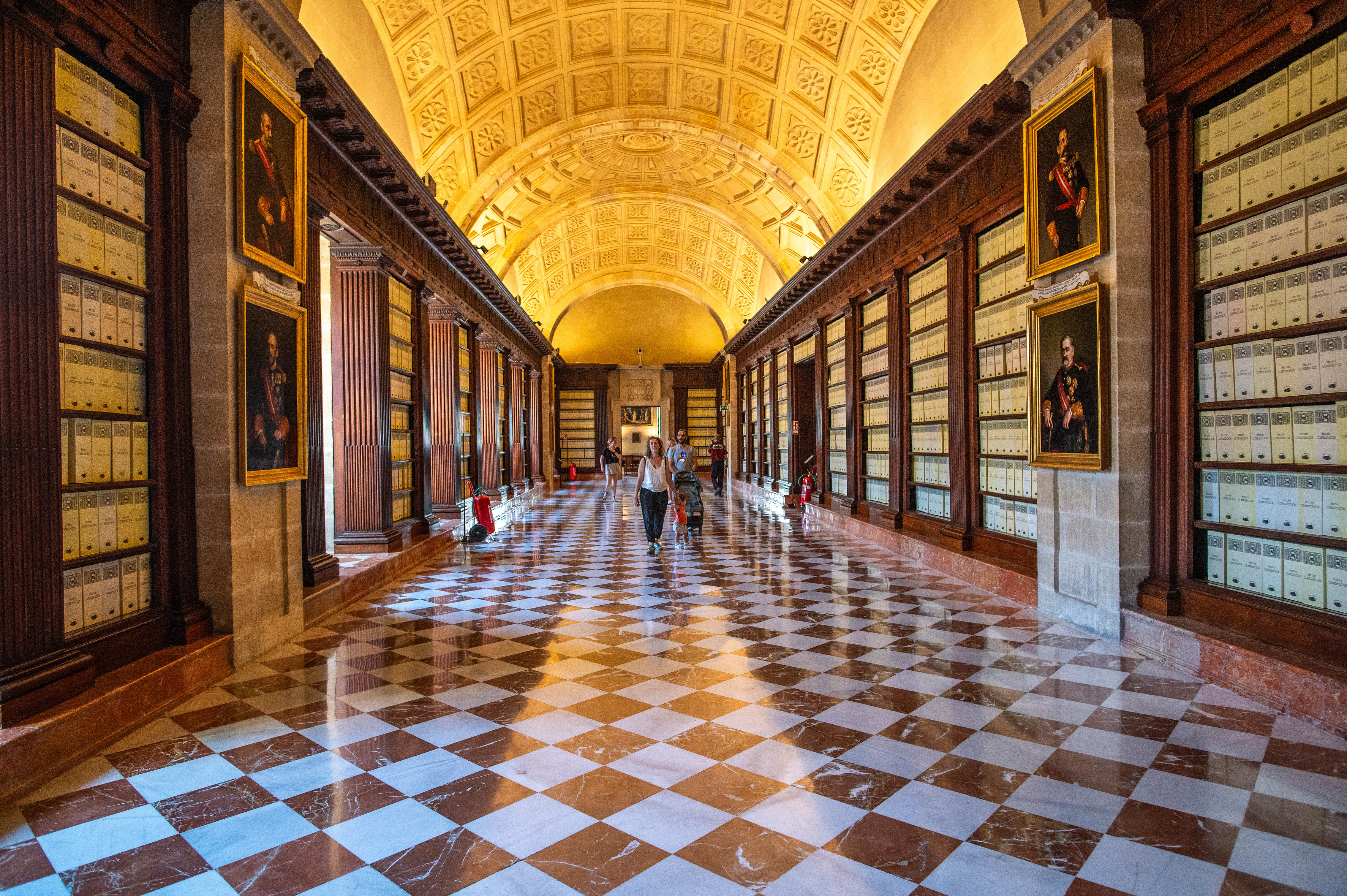 numerous framed portraits