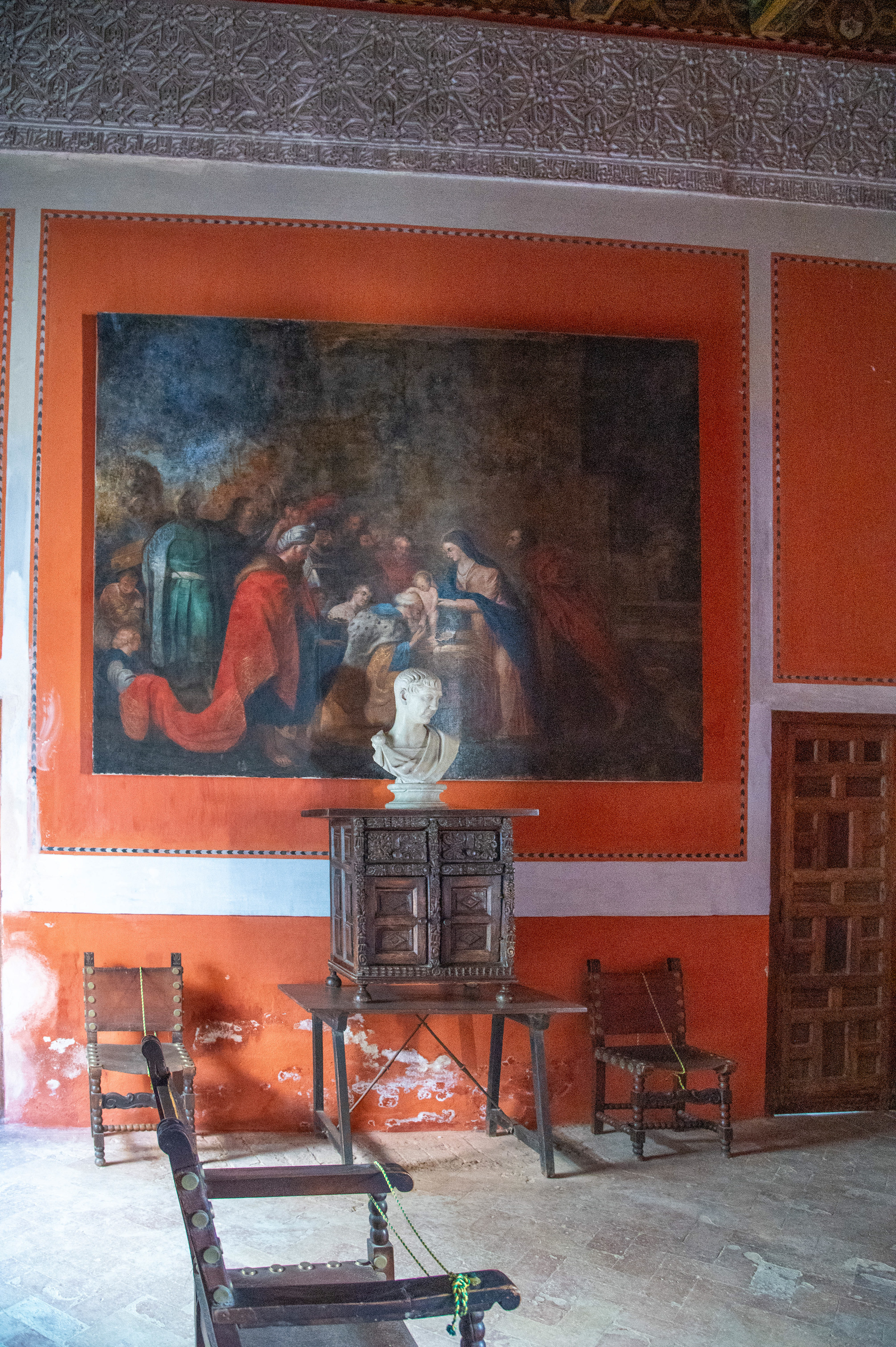 a room with vibrant orange walls