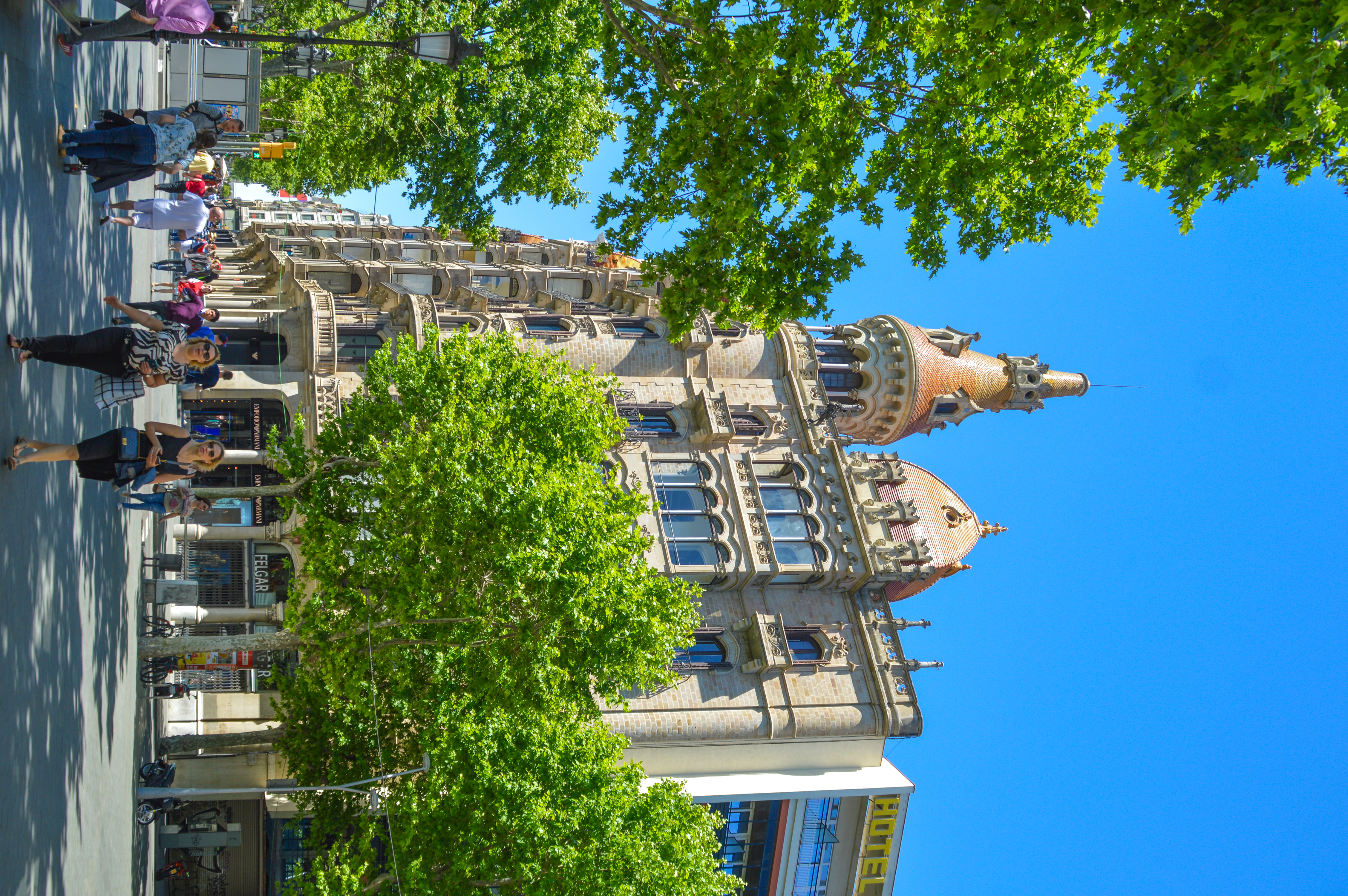 a prominent building featuring ornate architecture and a distinctive roof.