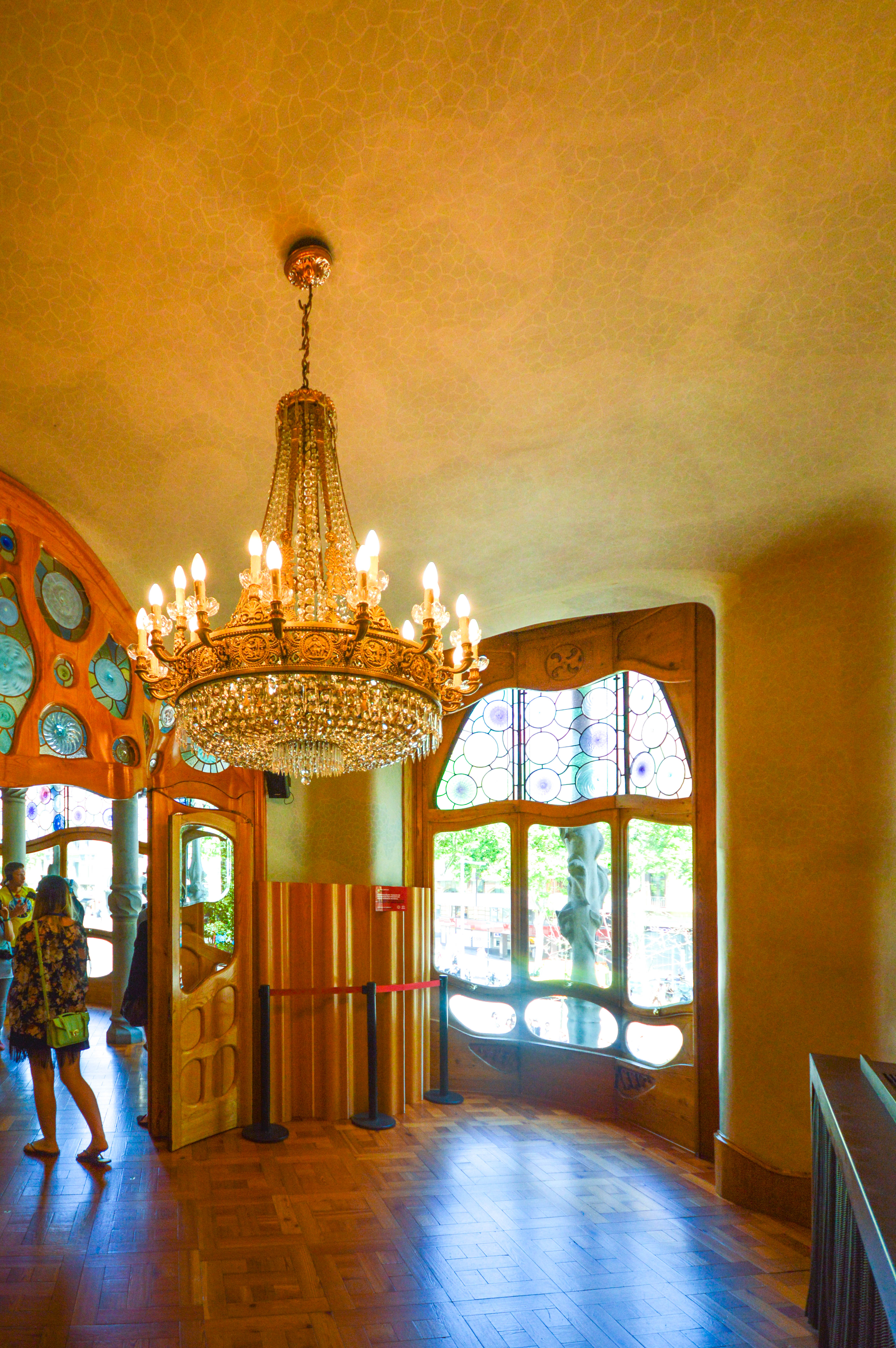 a large, elegant chandelier featuring multiple light bulbs