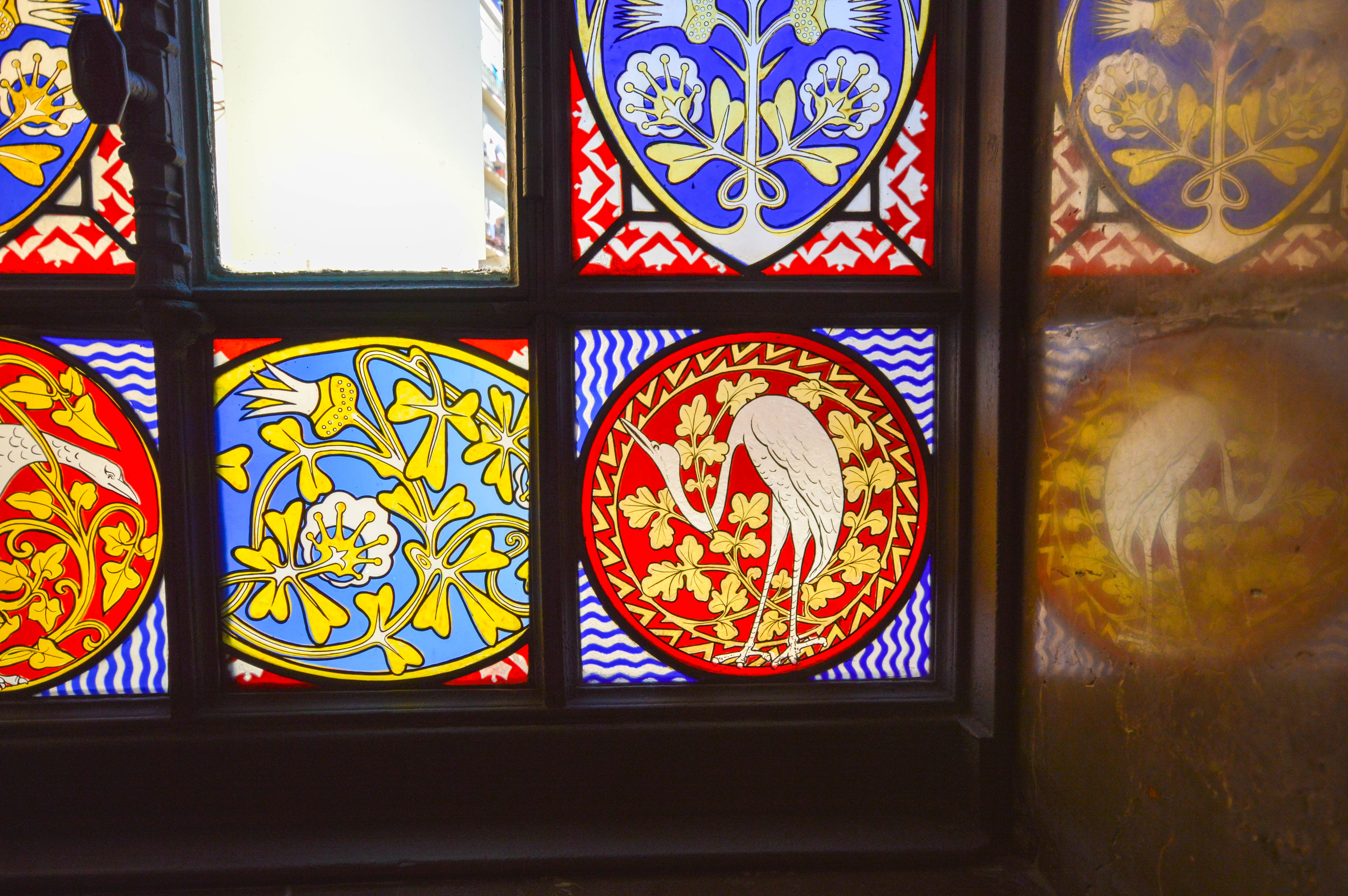 stained glass window featuring intricate designs