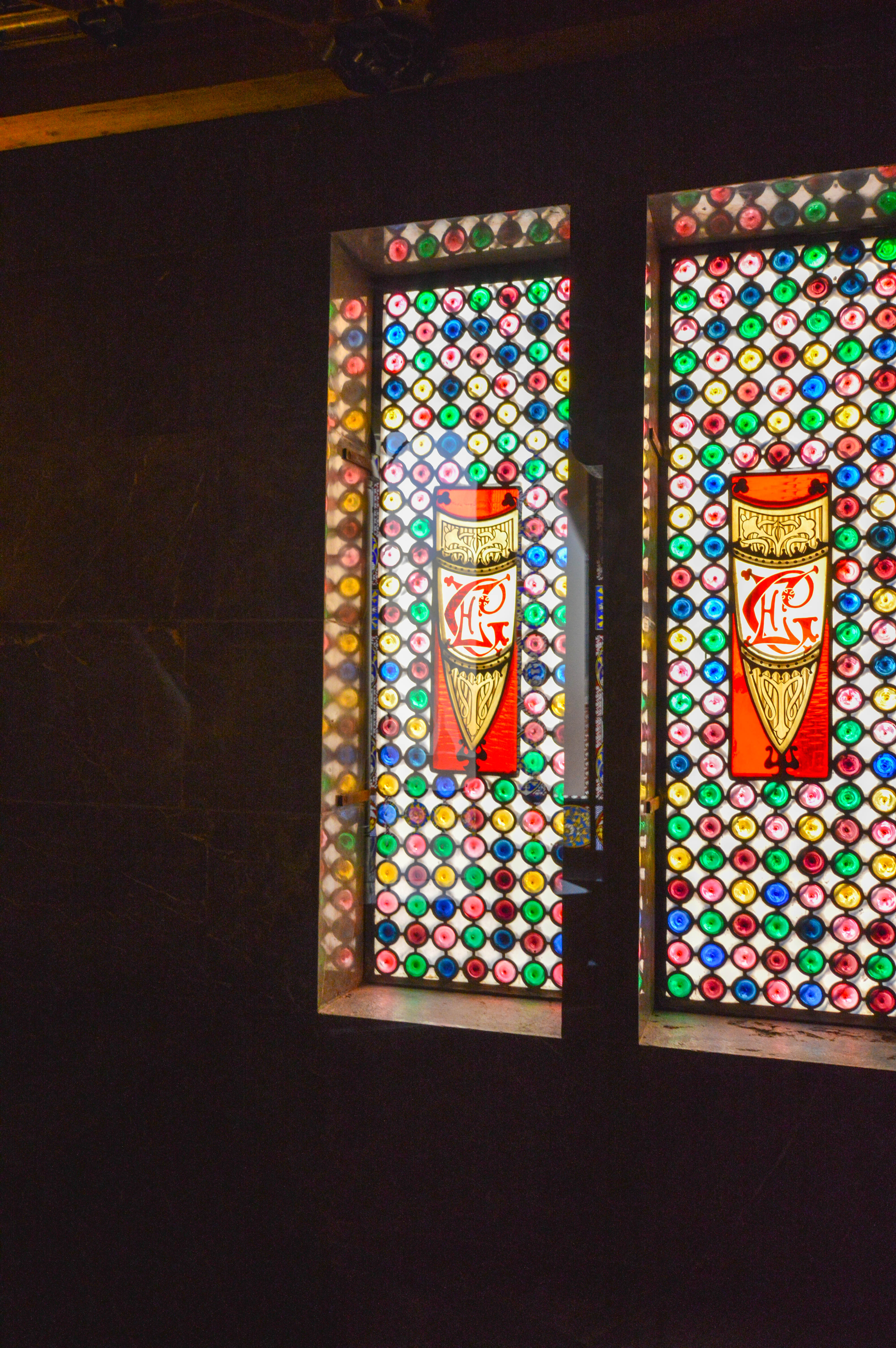 stained glass window with intricate designs and vibrant colors