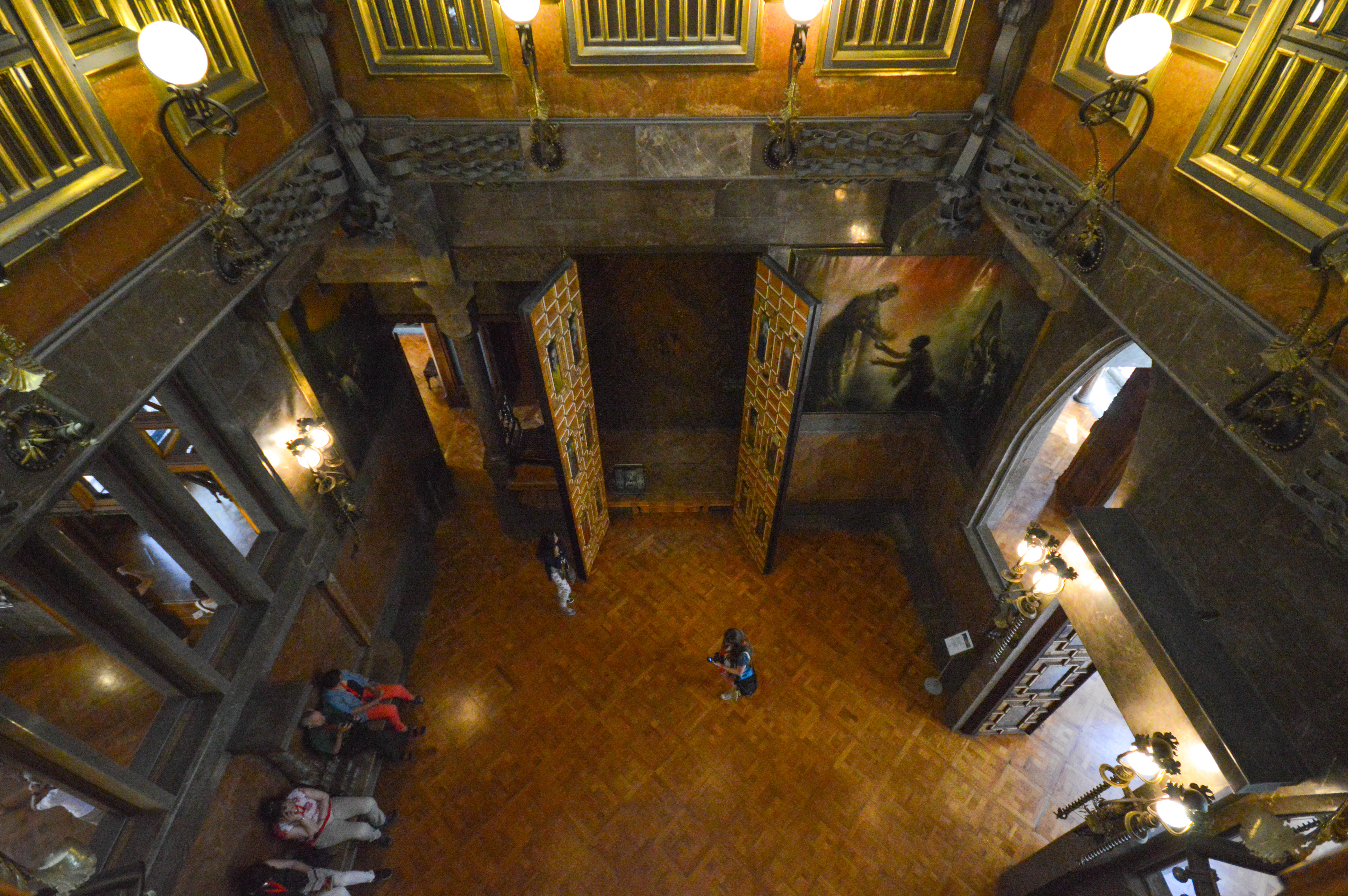 gold accents and large, elegant light fixtures