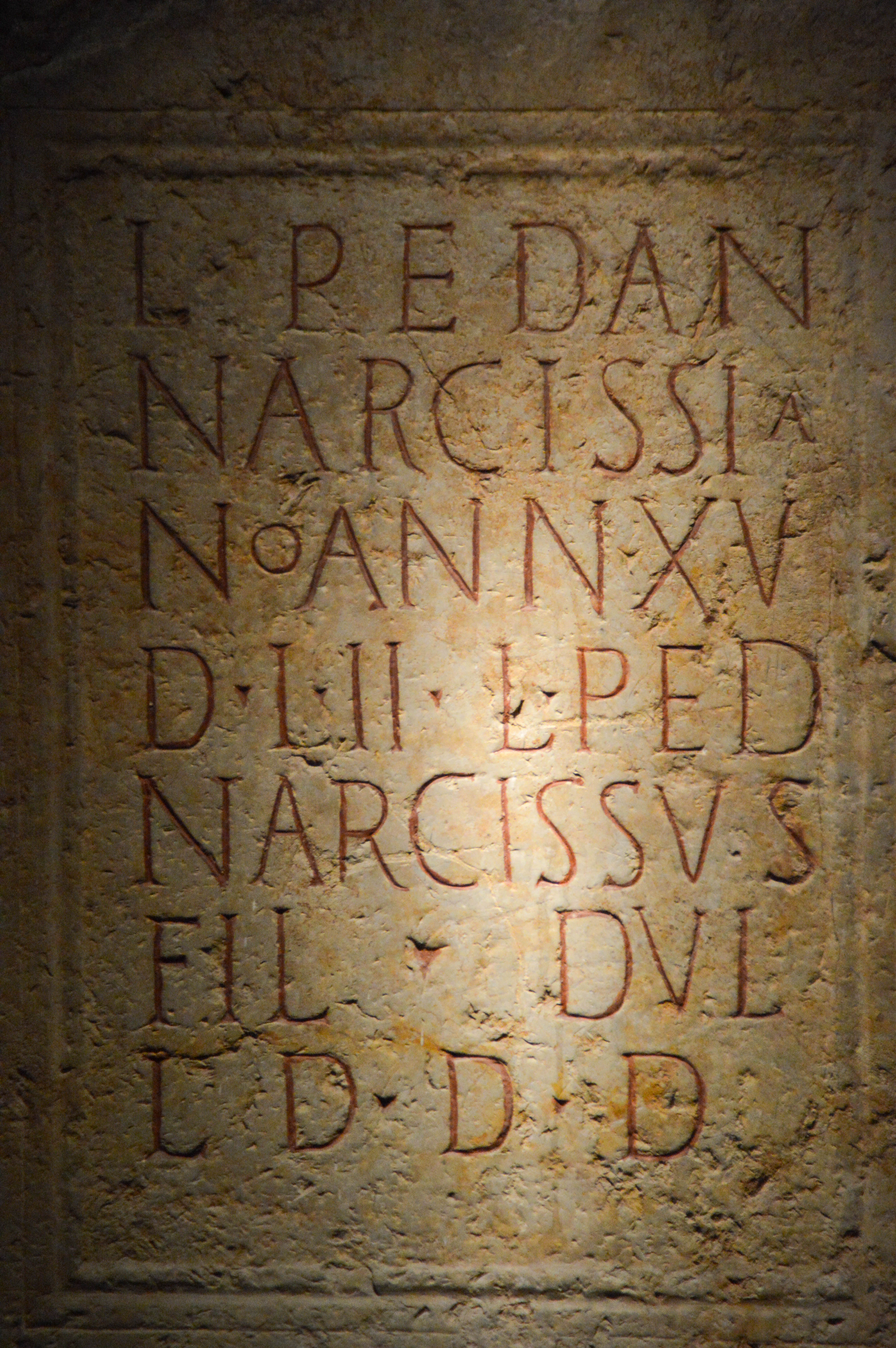 ancient inscription dedicated to Narcissia by her son Narcissus