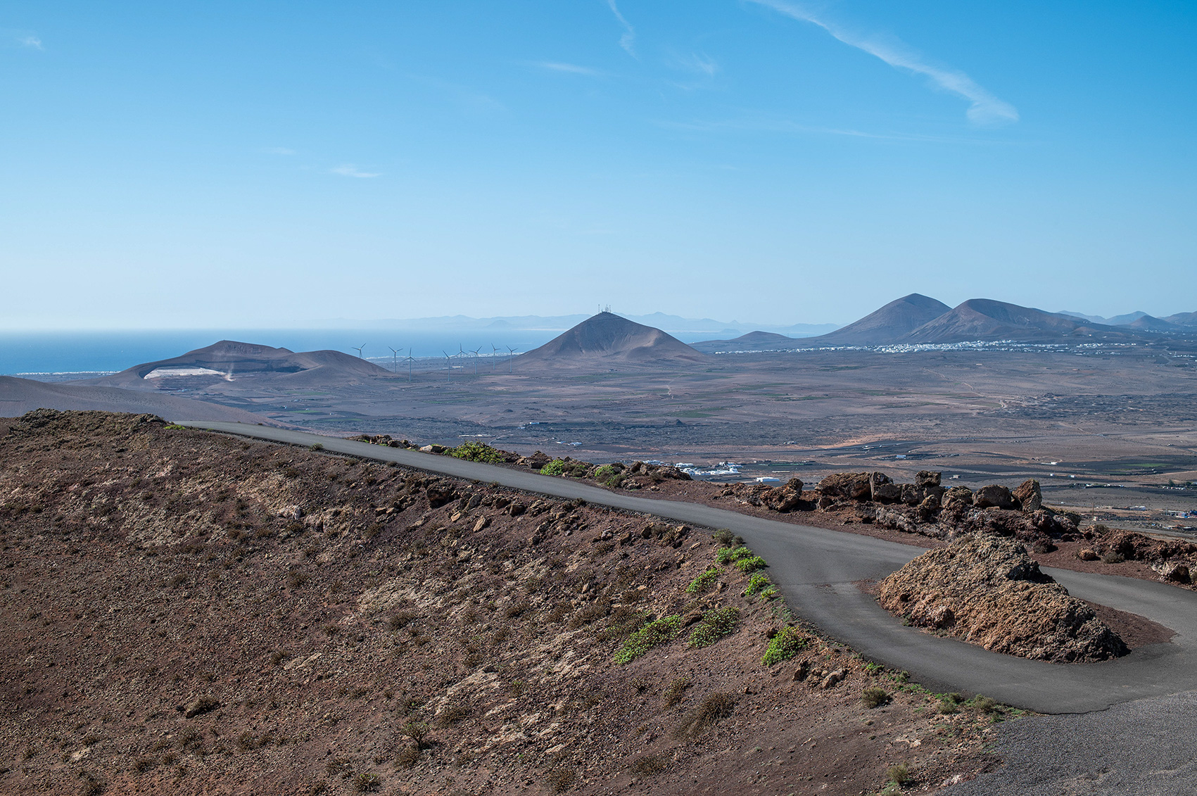 a vast, arid landscape with volcanic terrain