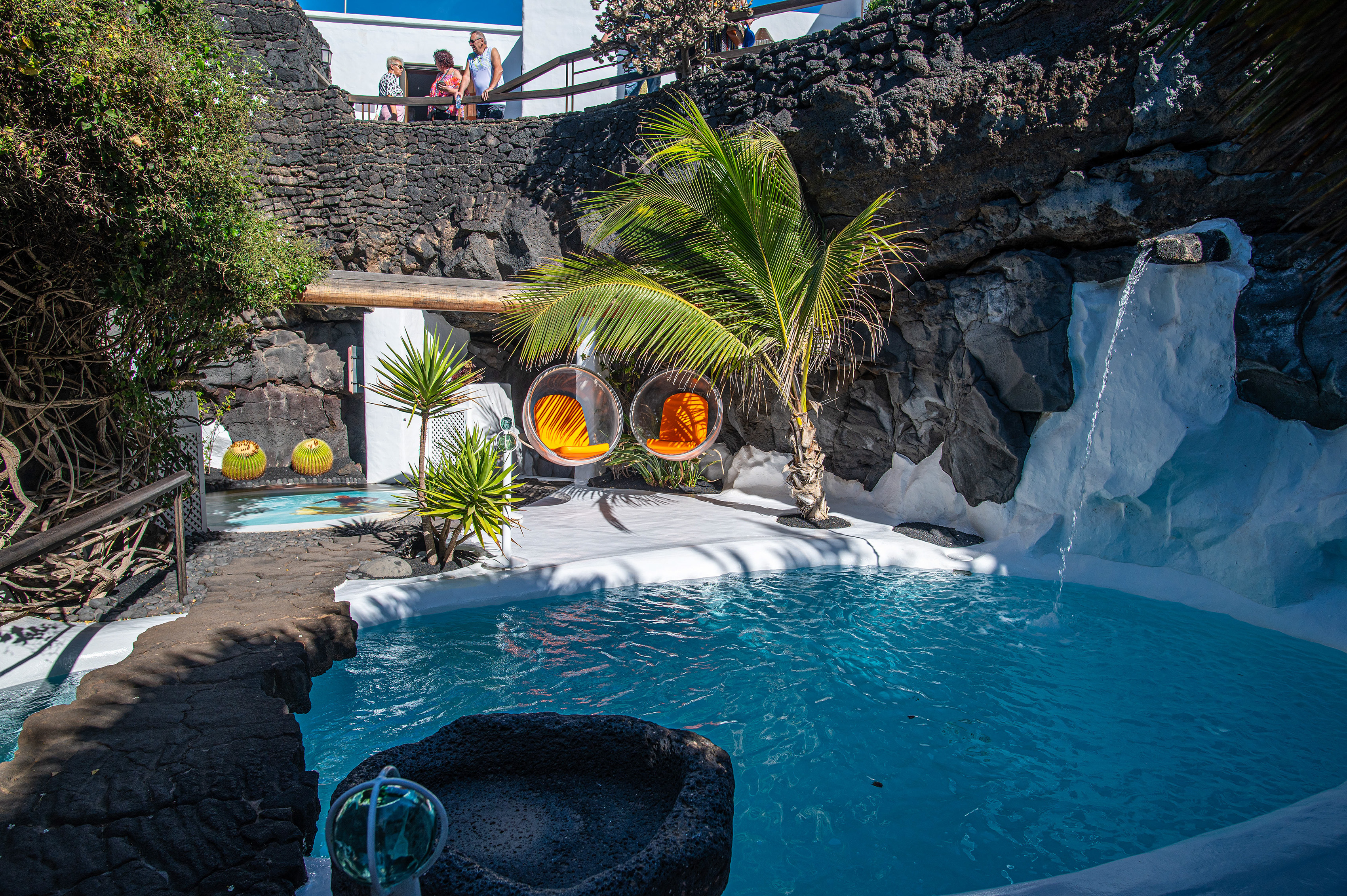 tropical pool area with clear blue water