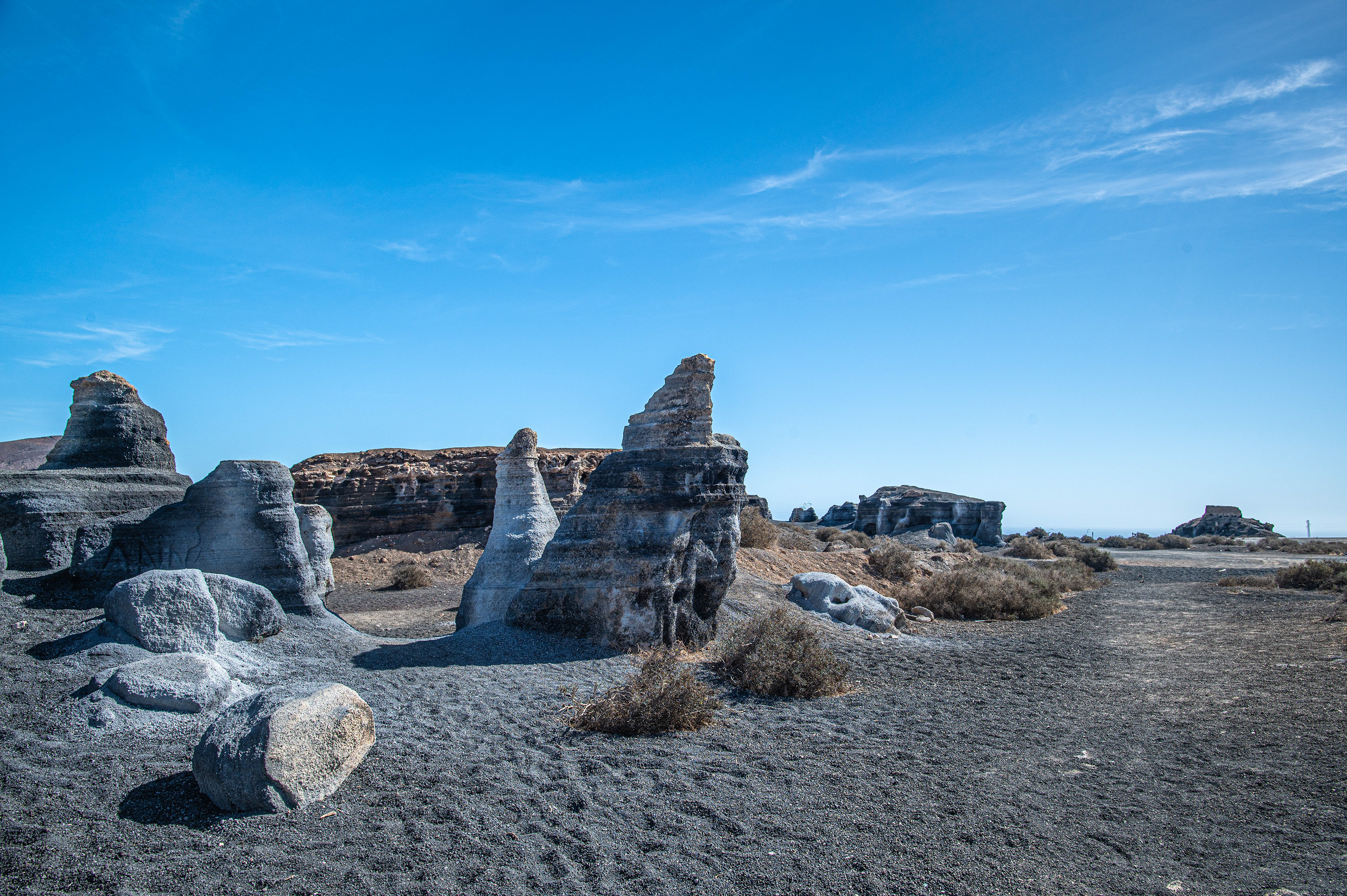 The rocks are tall, irregularly shaped, and scattered across the ground