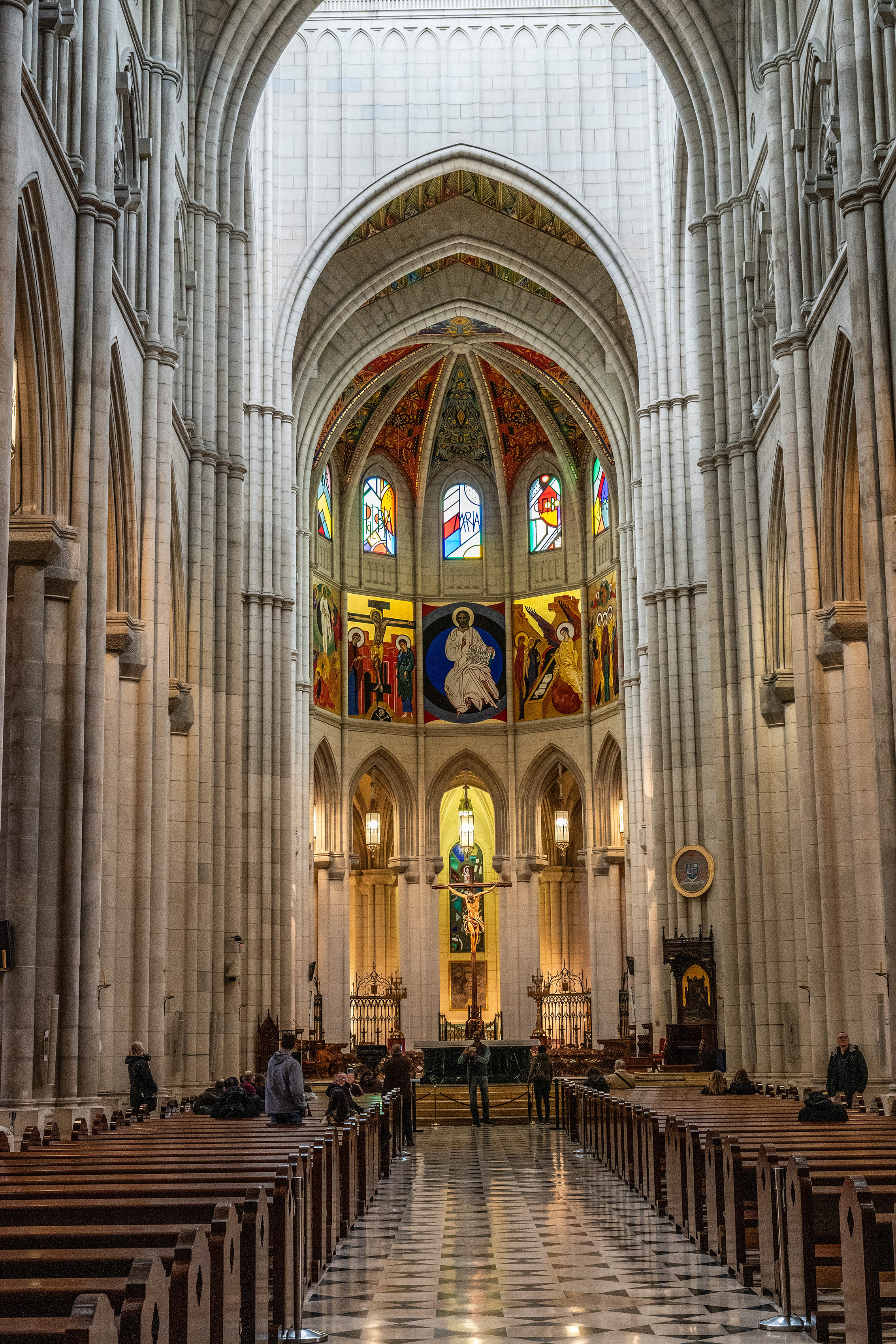 tall, white columns and high, arched ceilings
