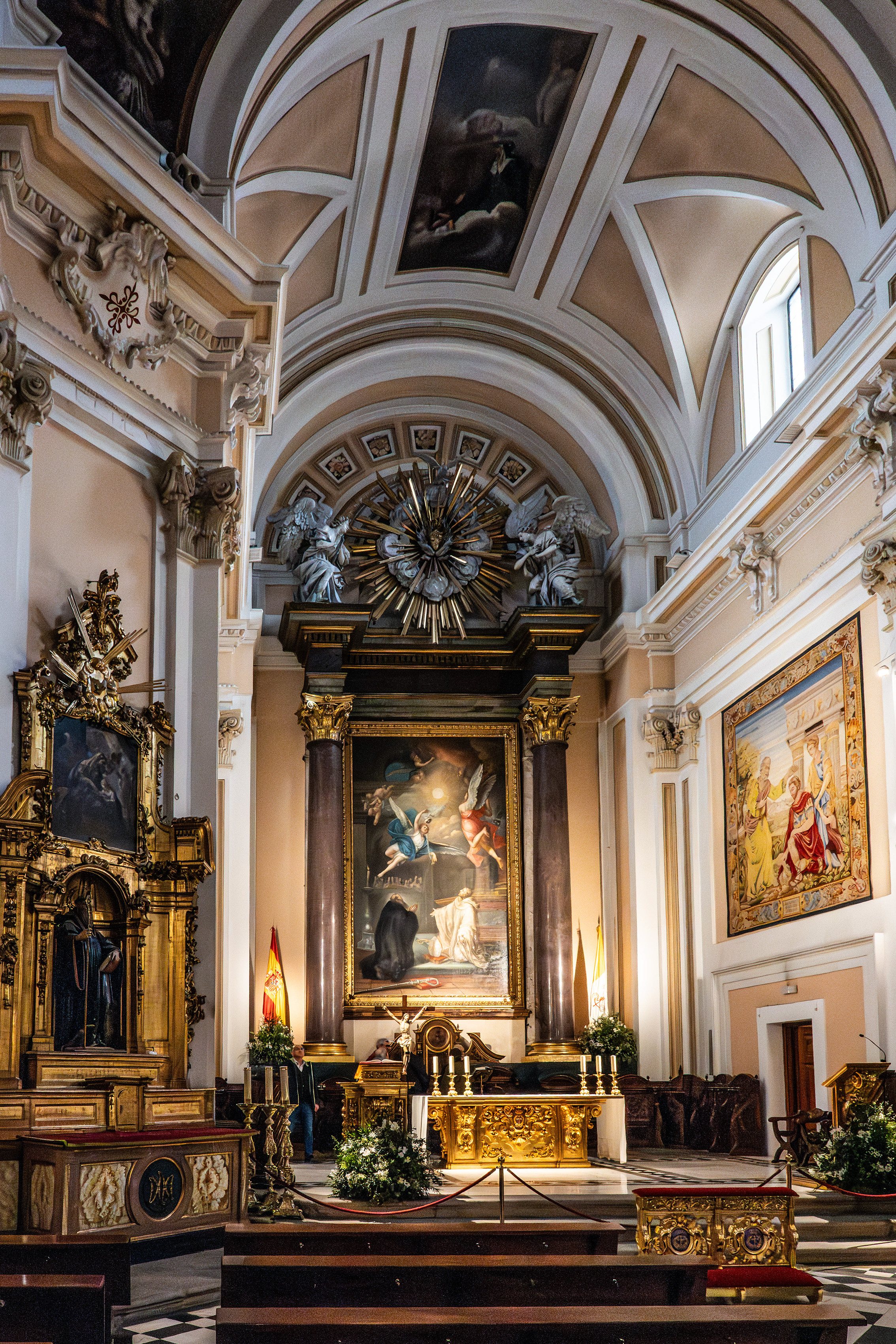 ornate altar, which features a large painting