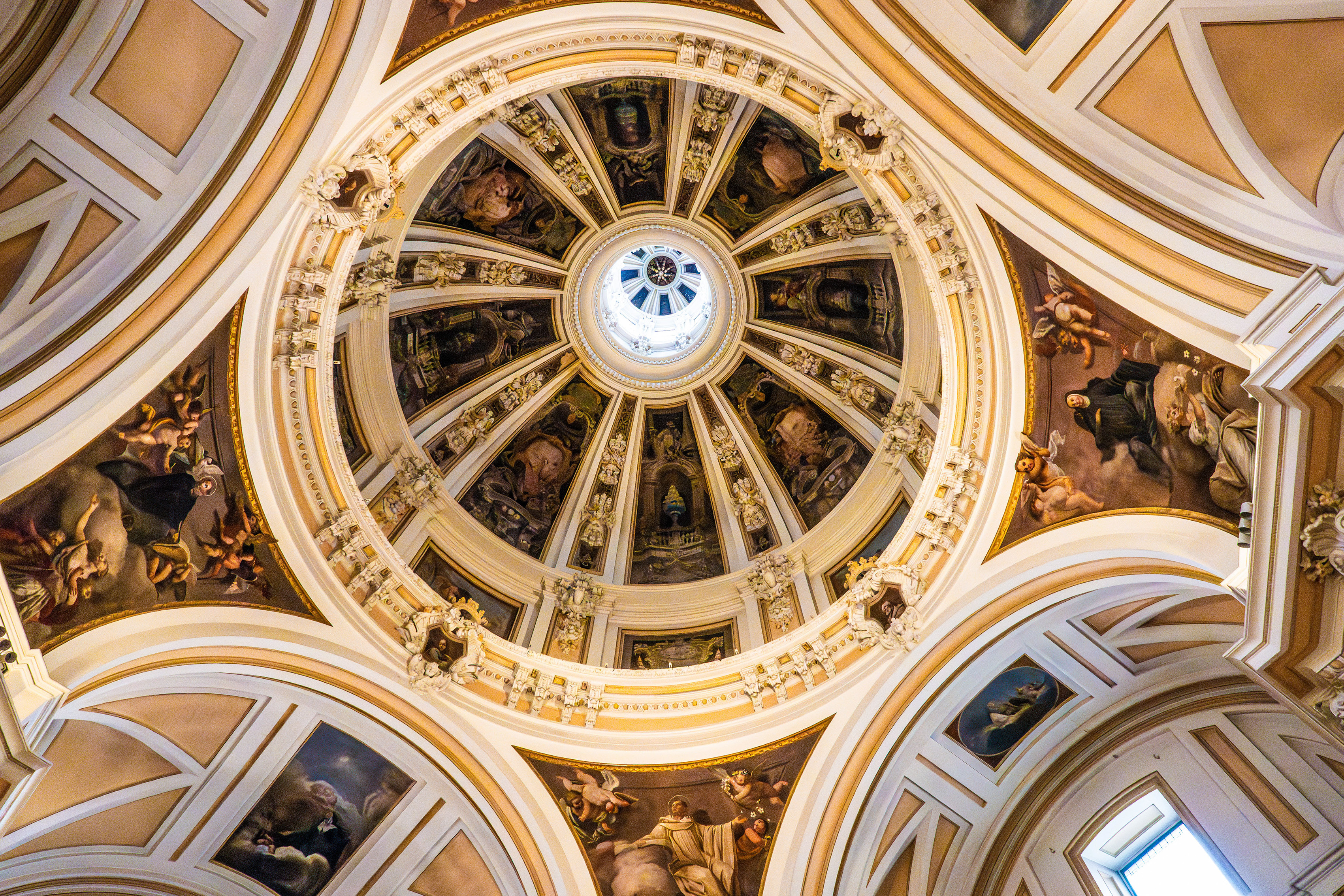 intricate frescoes and detailed stucco work