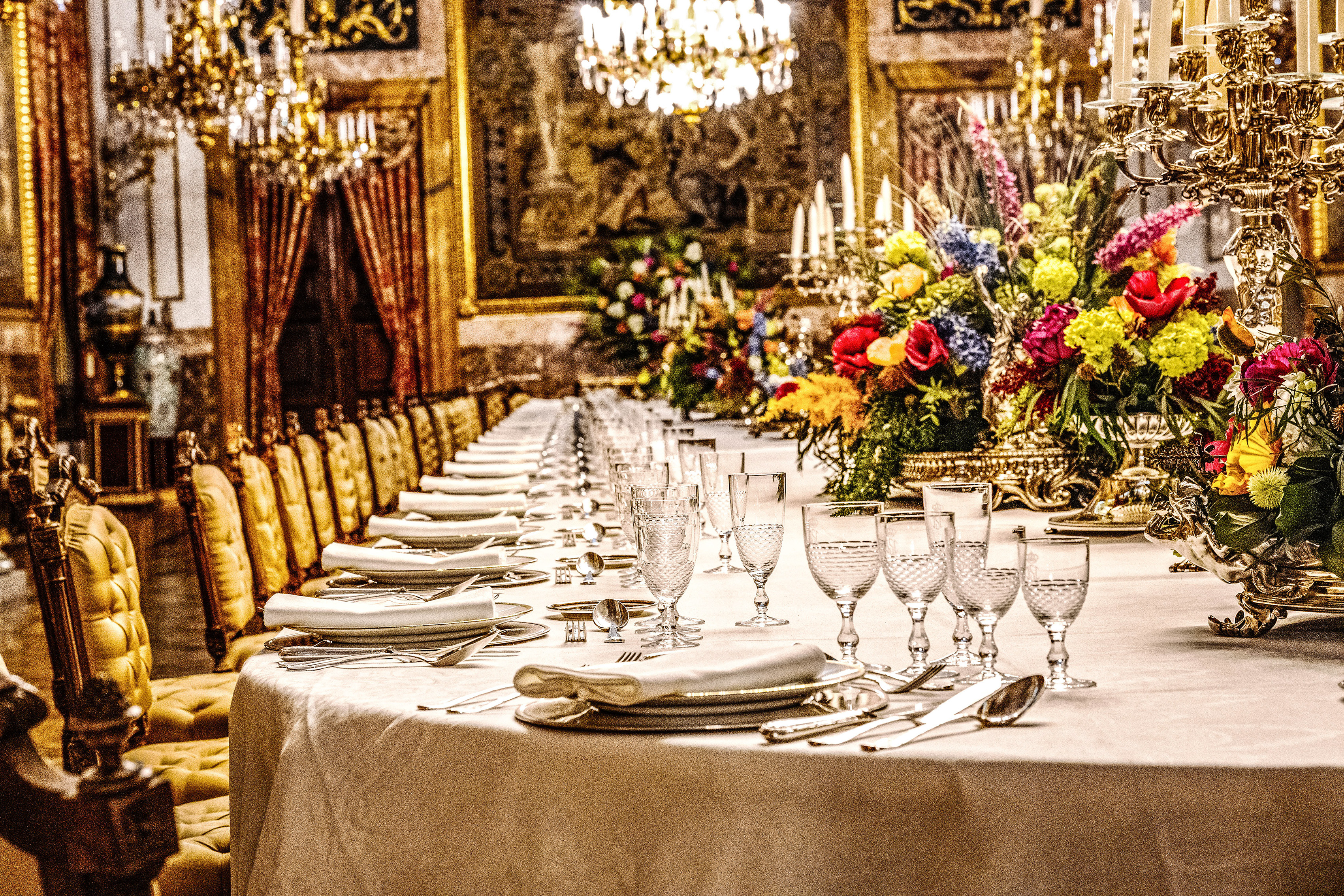 an elegantly set long dining table