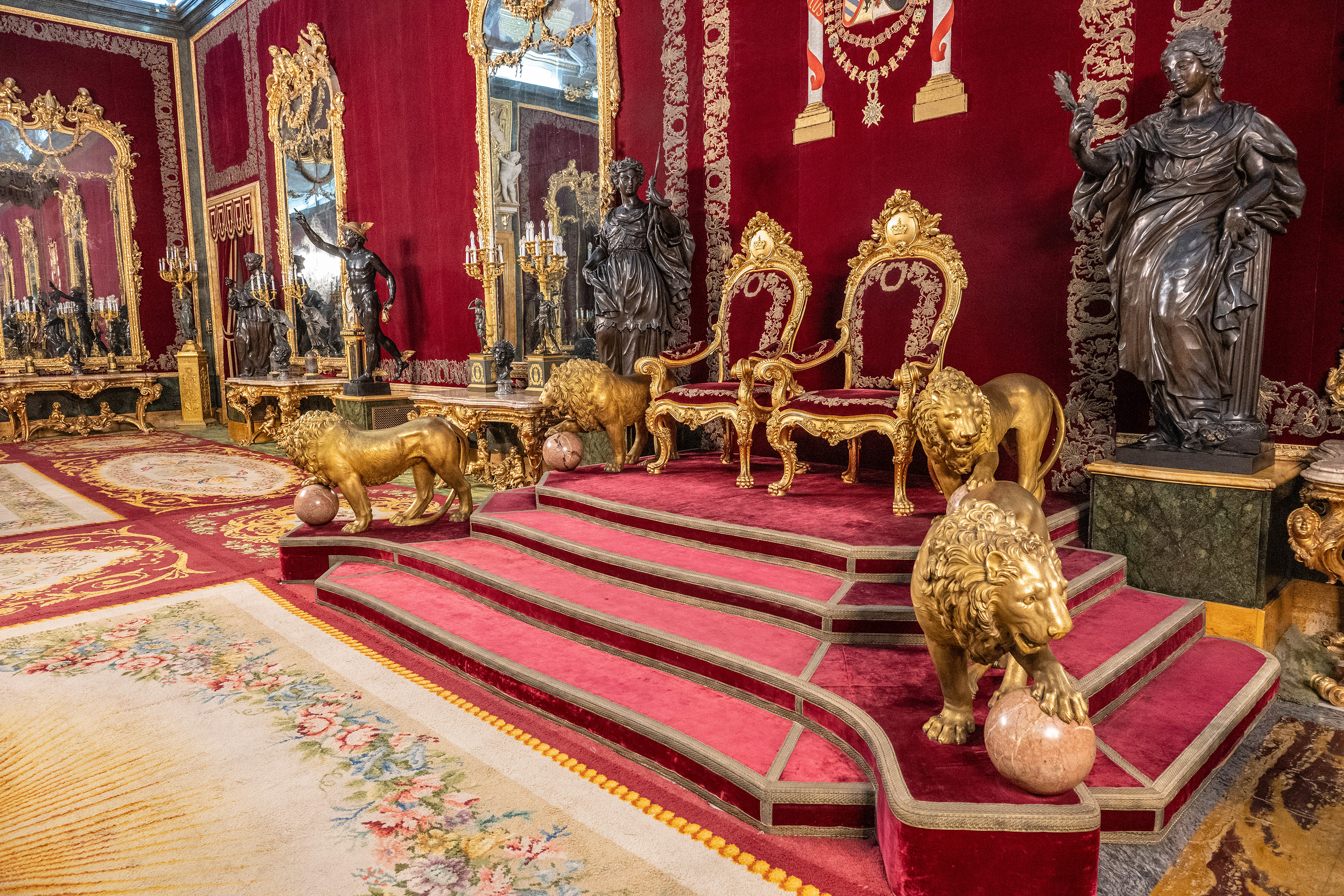 rich red walls and luxurious furnishings