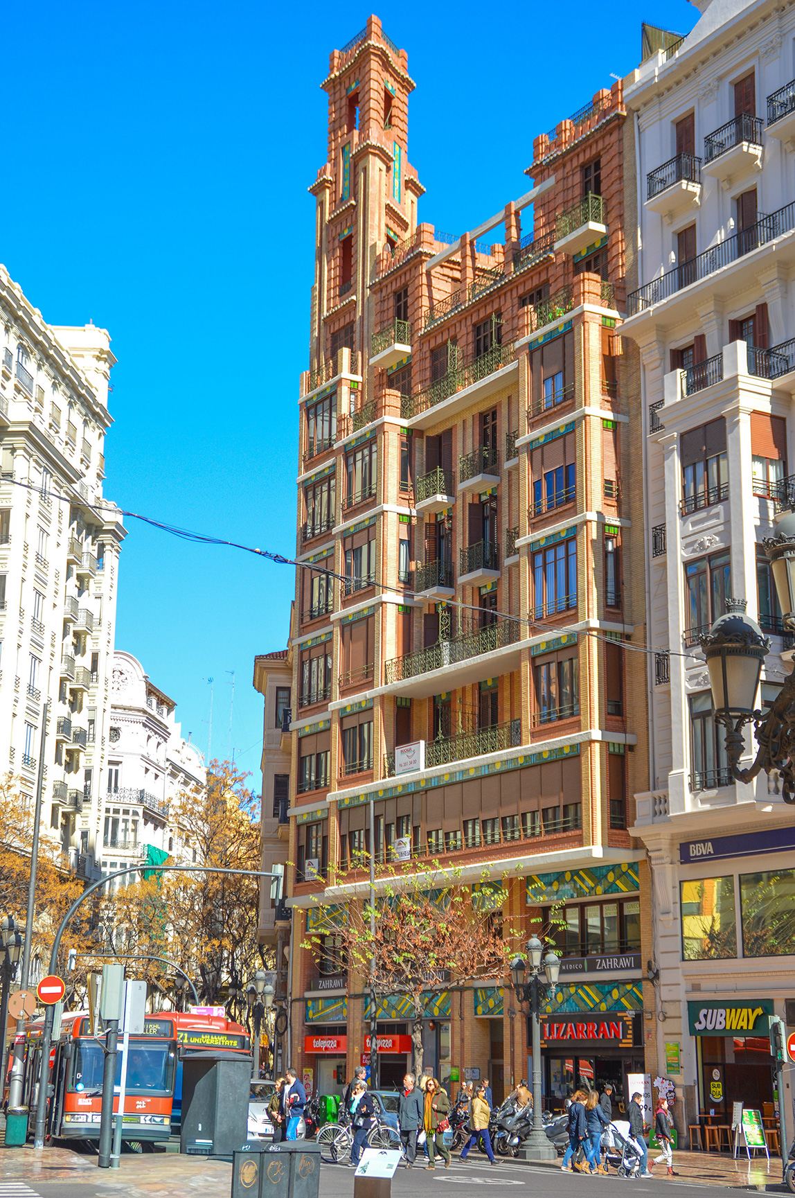 a multi-story building named Hotel Venecia