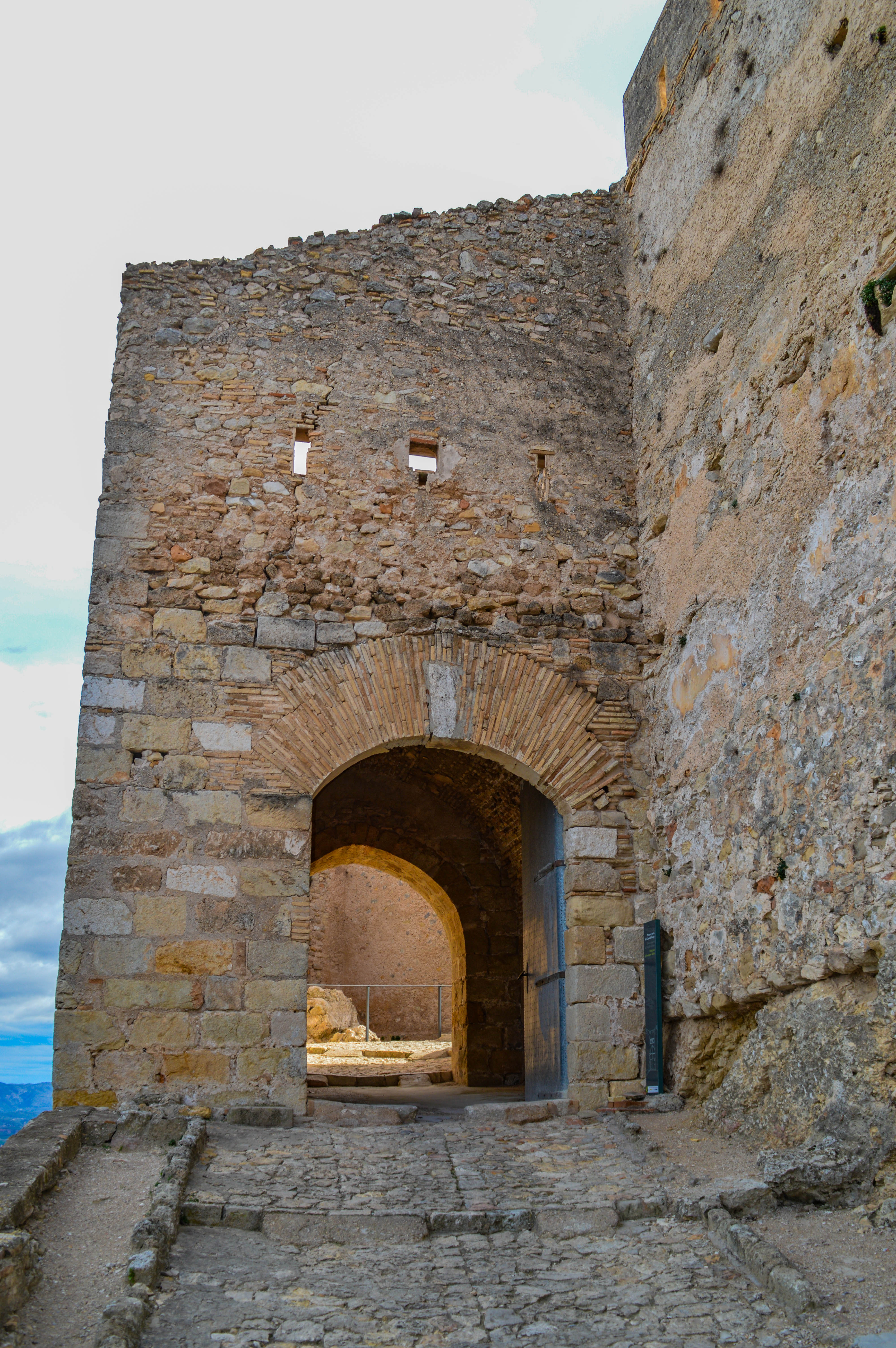 a large arched doorway made of bricks