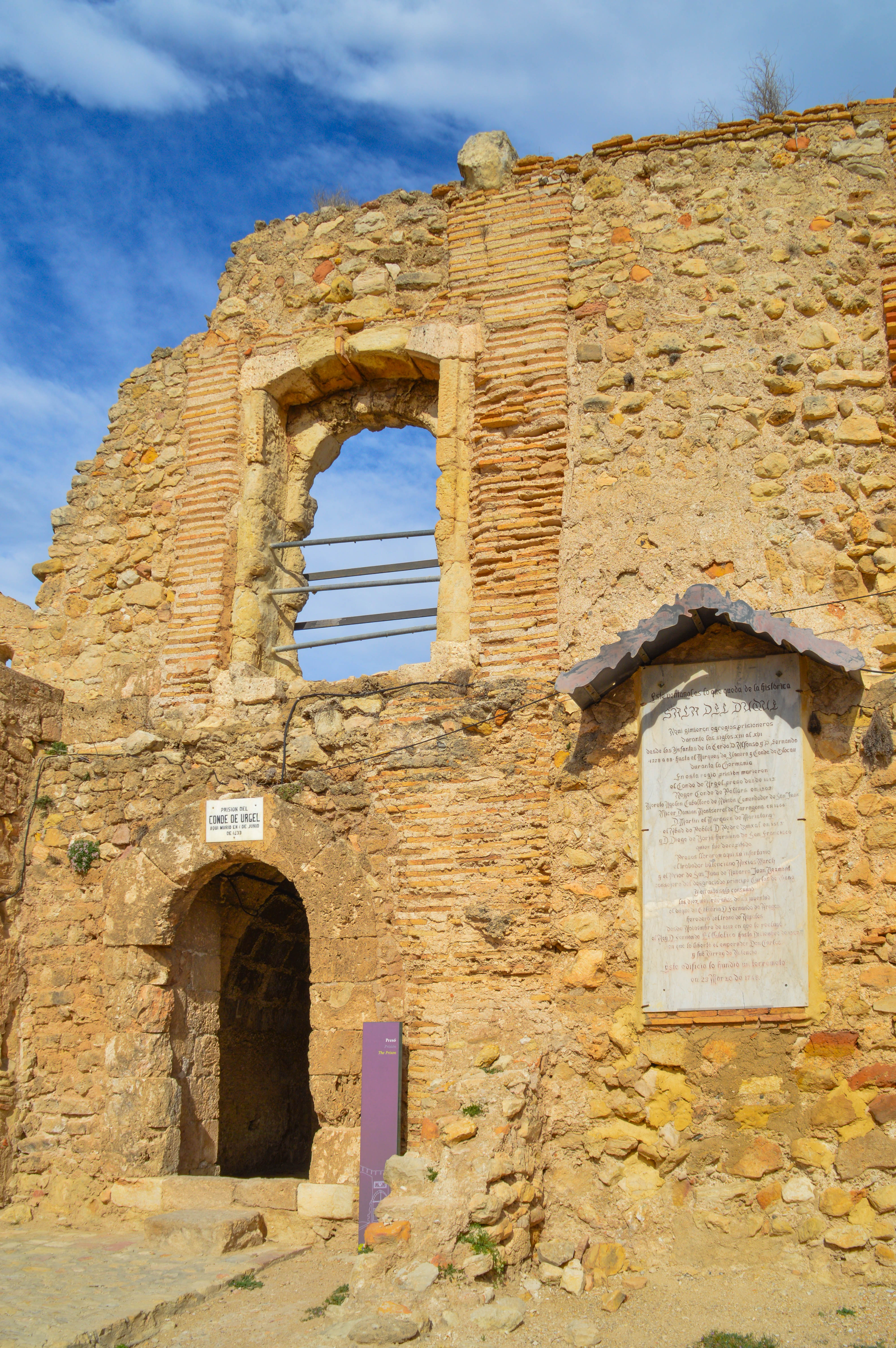 an arched doorway and a larger archway above