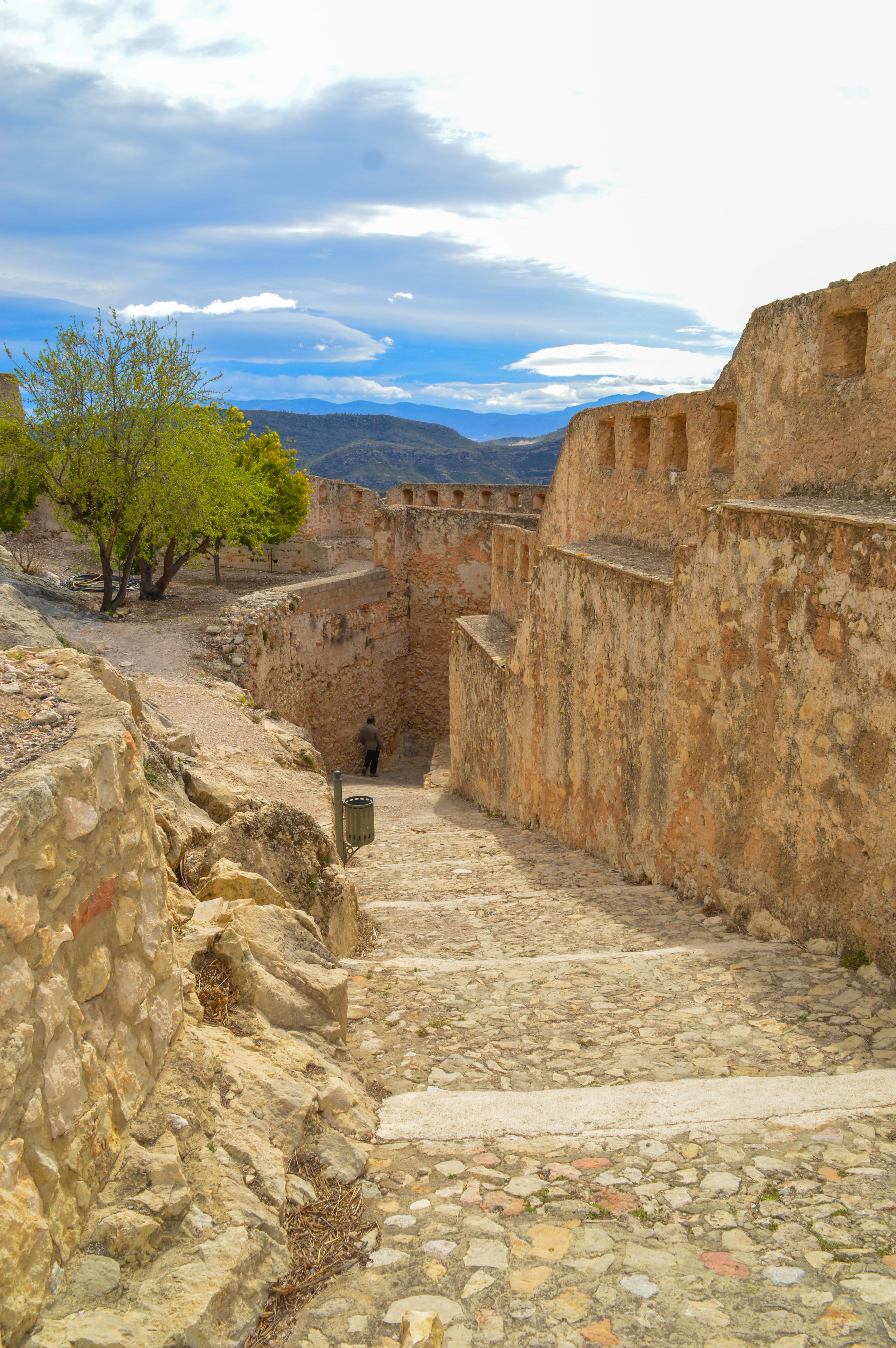 stone walls and a scenic view of mountains