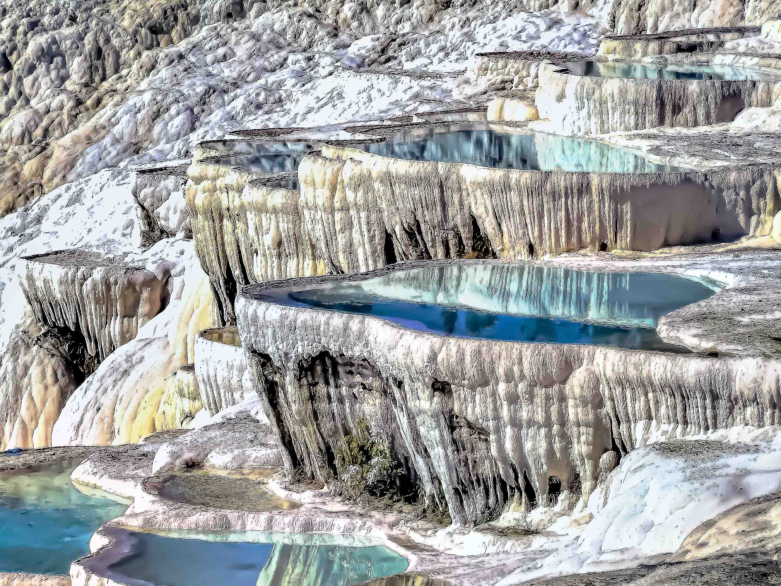 a stunning natural landscape featuring terraces filled with water