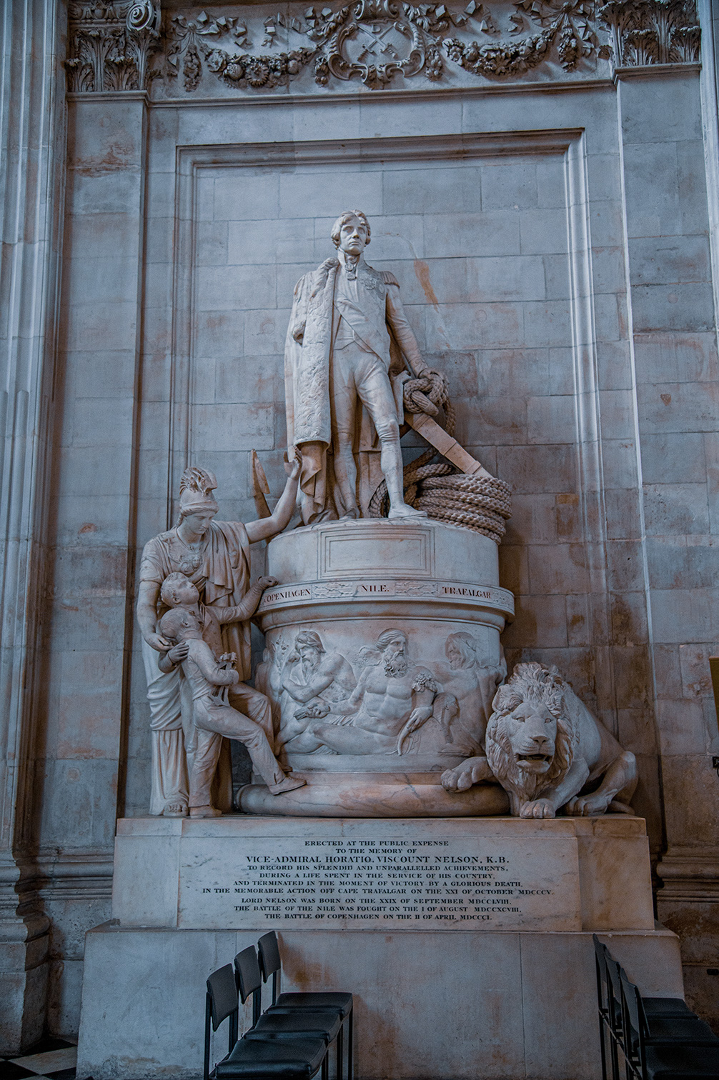 The document describes a monument erected in memory of Vice-Admiral Horatio Nelson, detailing his life, achievements, and notable battles such as the Battle of the Nile, the Battle of Copenhagen, and the Battle of Trafalgar. It highlights his birth date and the specific dates of these significant naval engagements, culminating in his death during the Battle of Trafalgar.