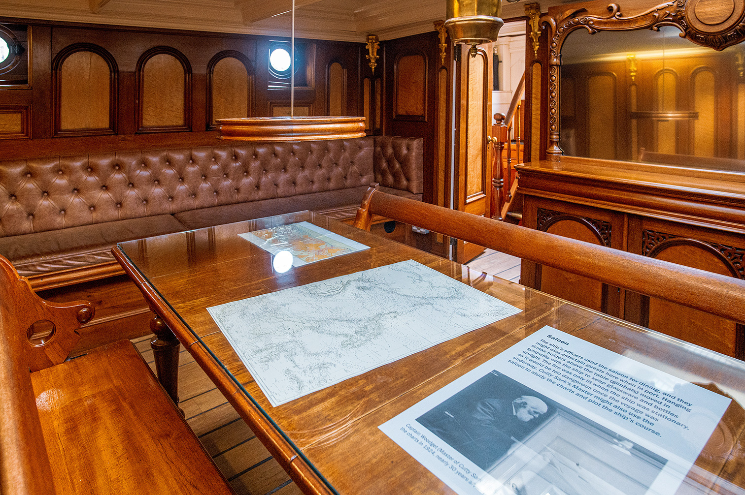 The document describes the use of the salon on a ship by officers for activities like dining and navigating. They used instruments such as sextants and charts to plot the ship's course, especially at night when visibility was limited.
