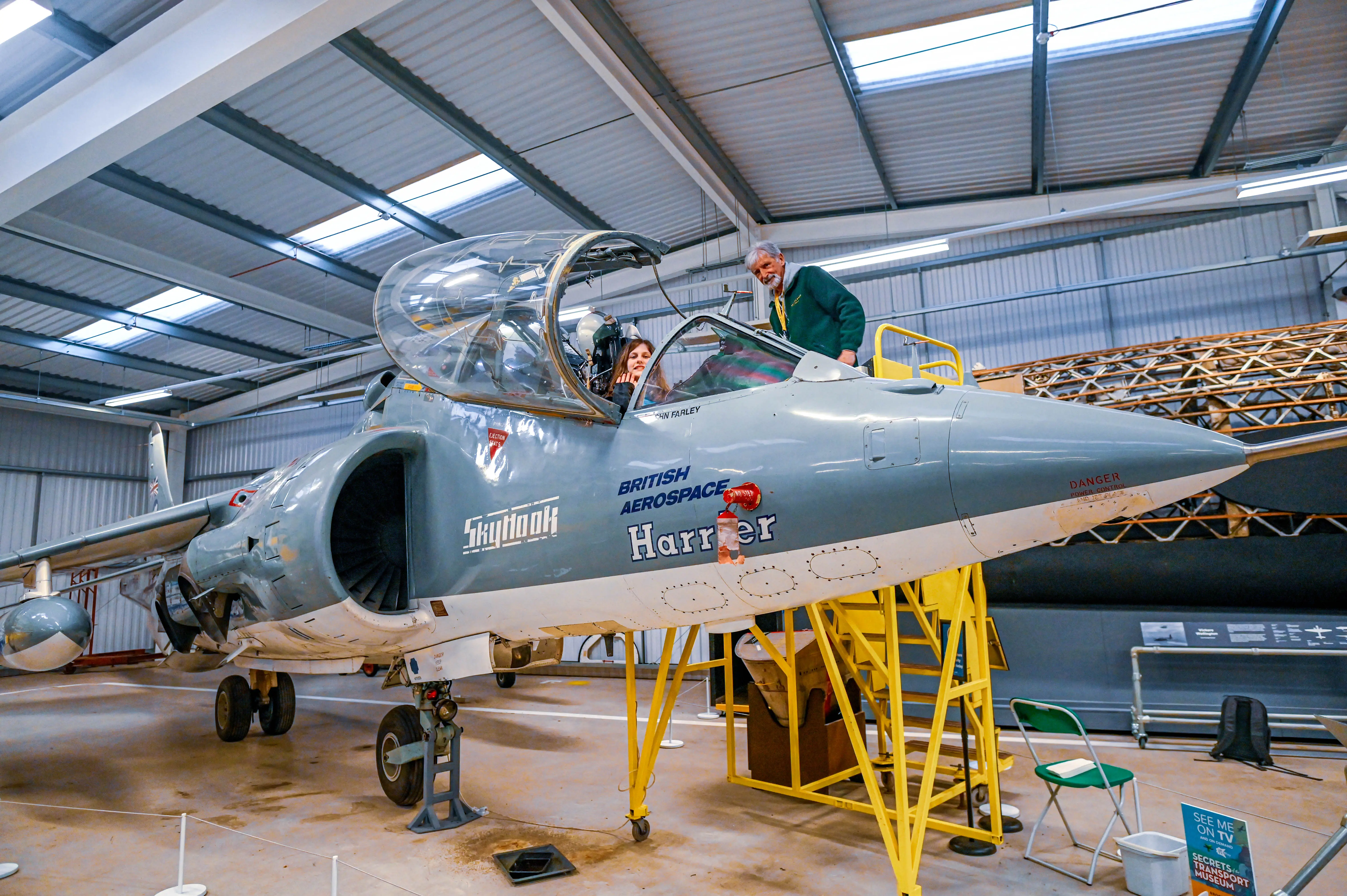 A grey British Aerospace Harrier jet with the word 