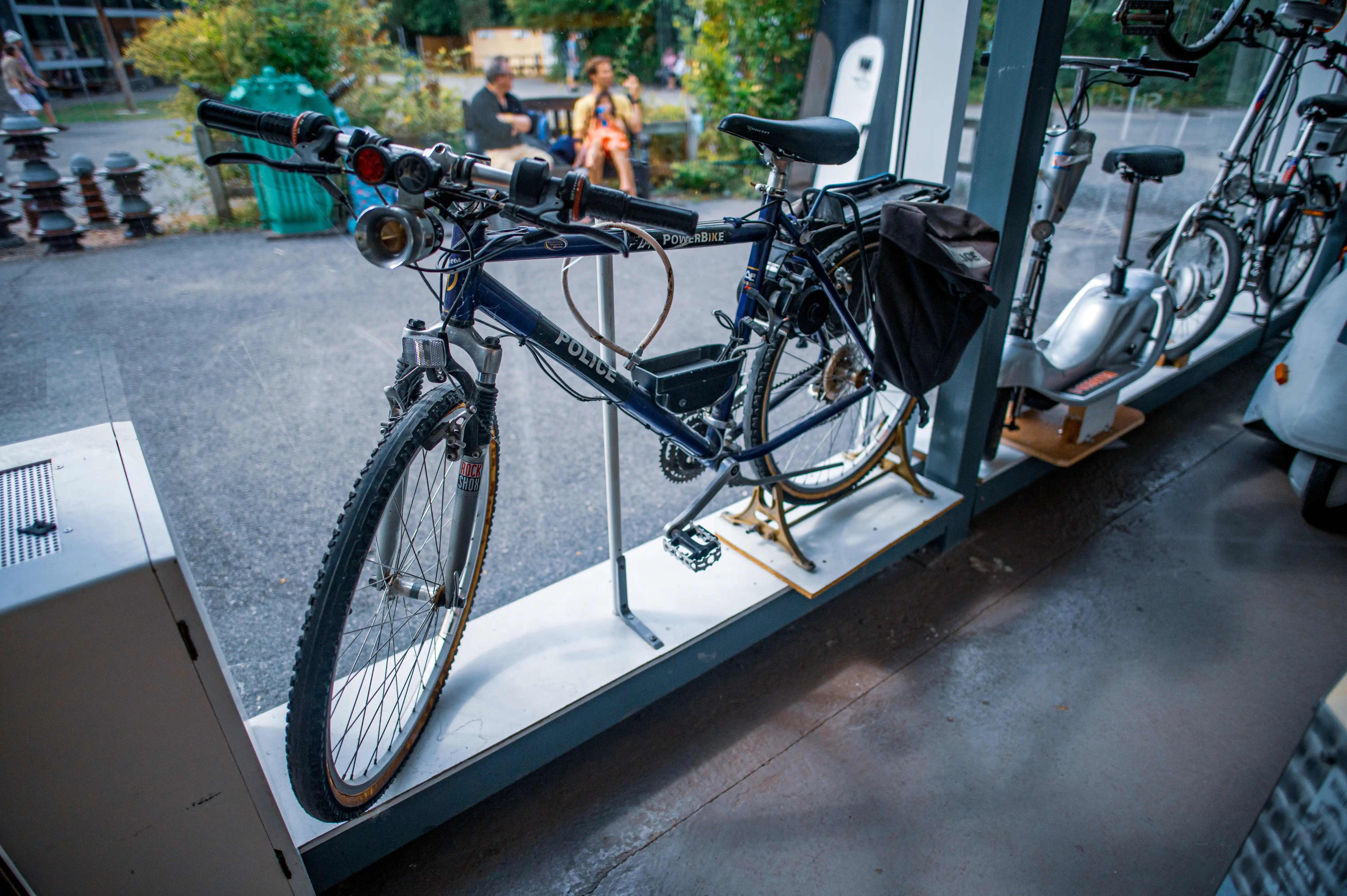 A navy blue police bicycle with 