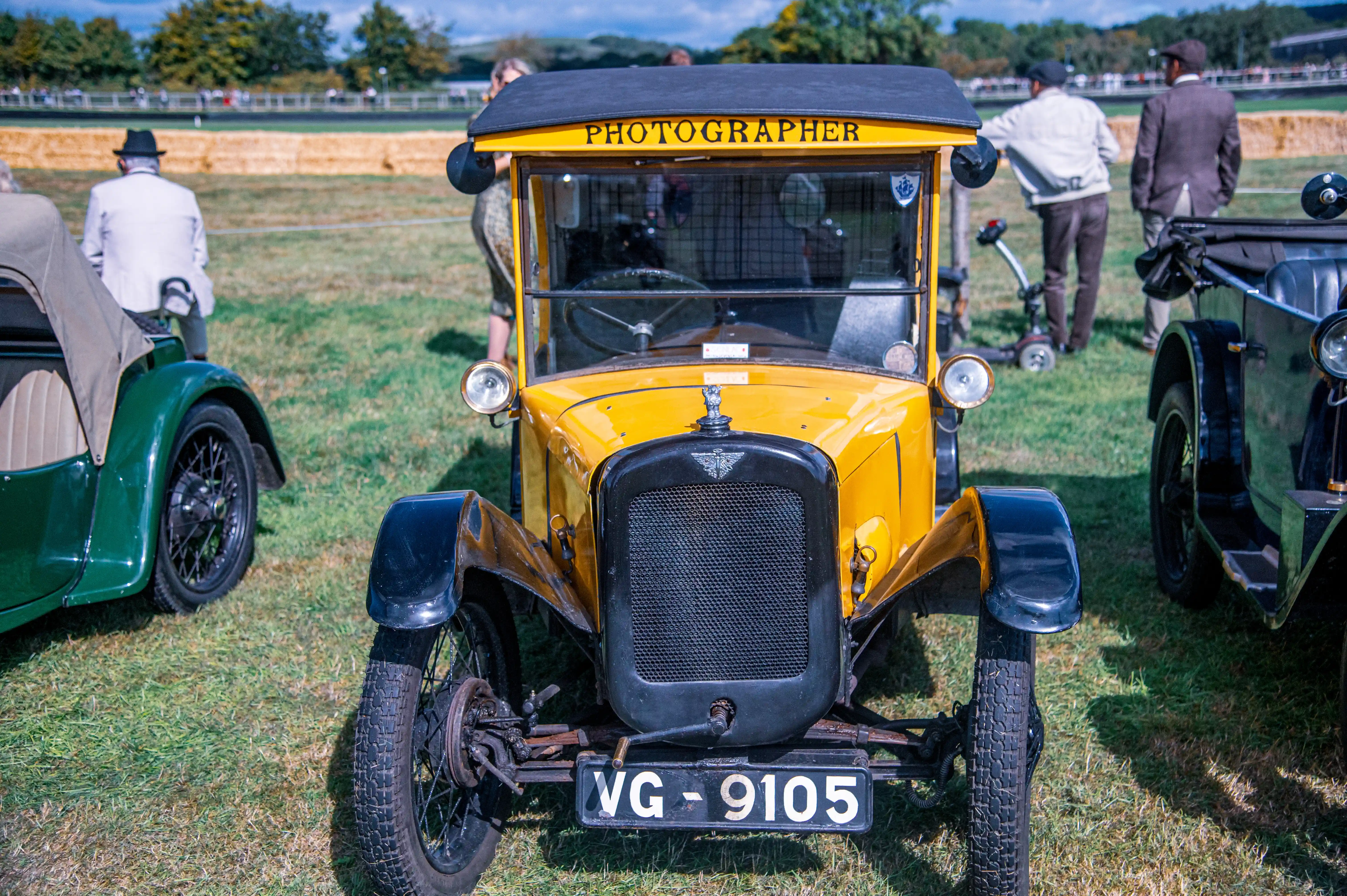 Front view of a bright yellow vintage van with 