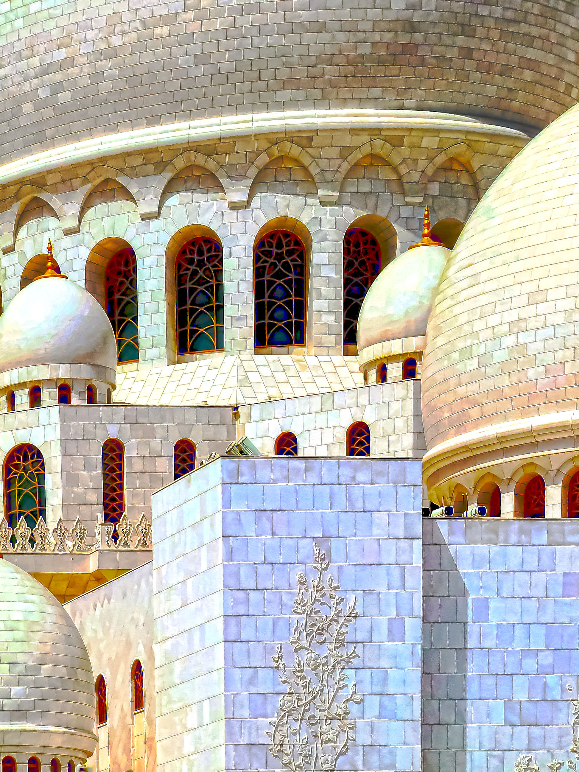 arched windows with colorful, stained glass patterns and ornate decorations