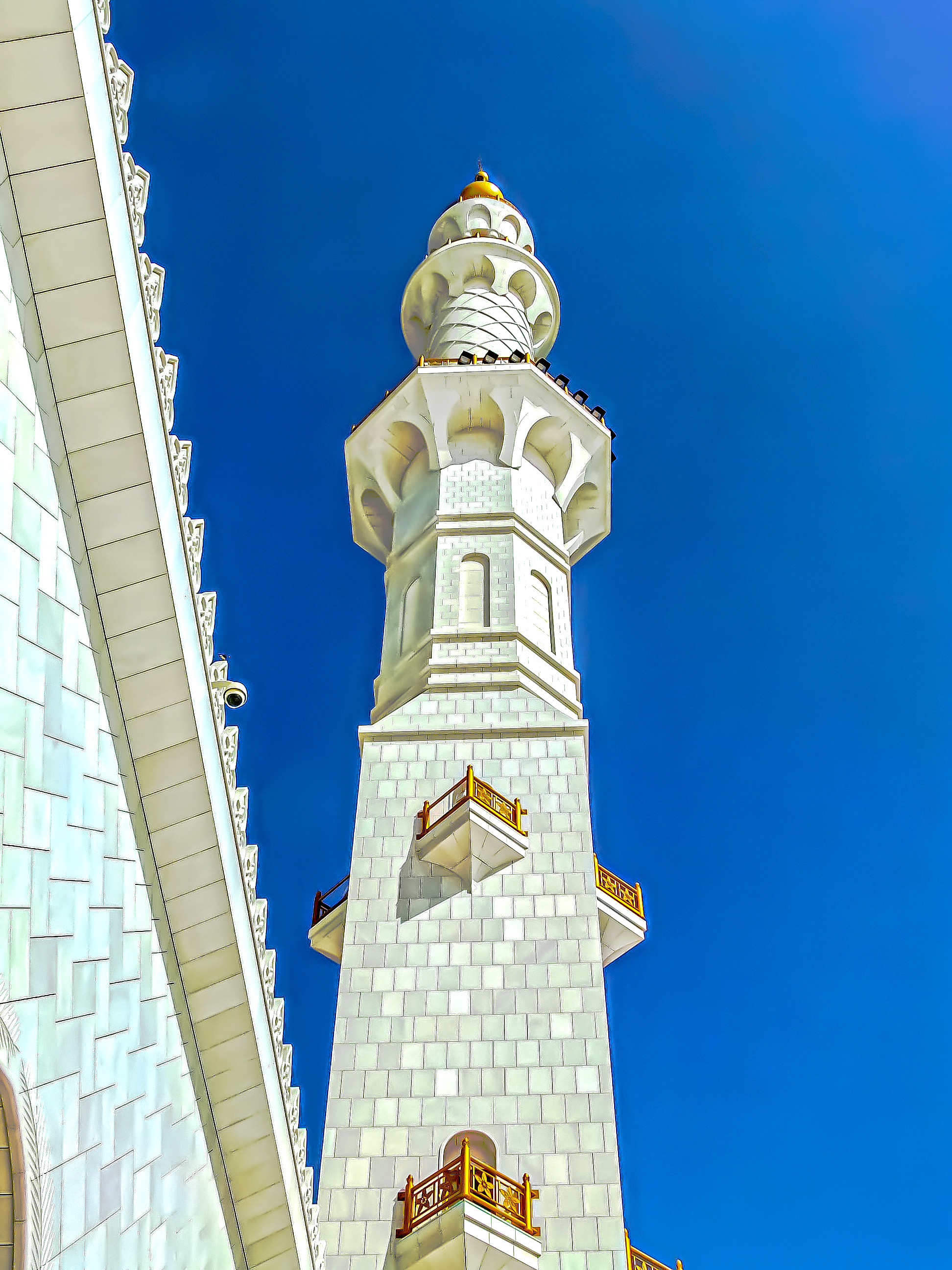 a tall, ornate tower with a golden dome at the top